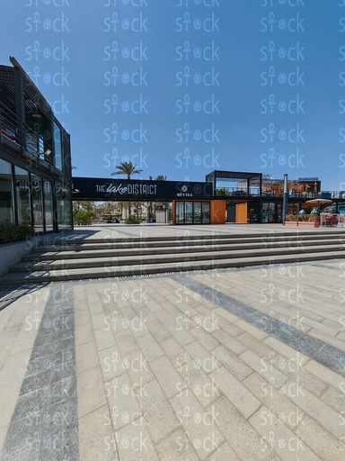 Lakeside promenade with skyline