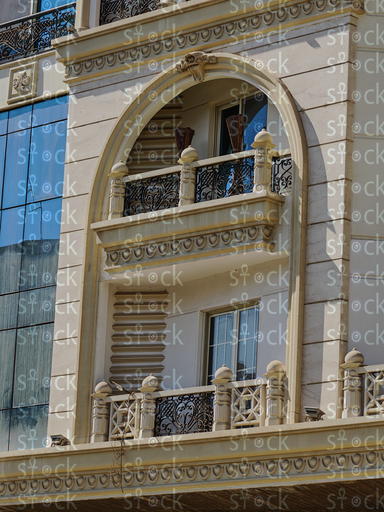 Details of an ornate arched balcony