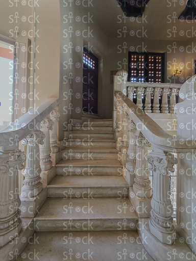 Marble staircase with carved balustrade