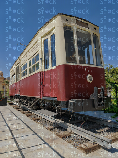 Vintage red tram on tracks