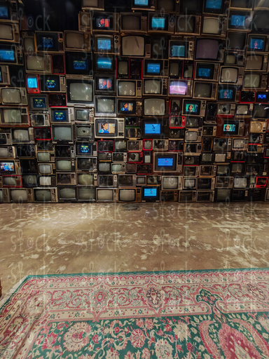 An art wall of stacked TV screens