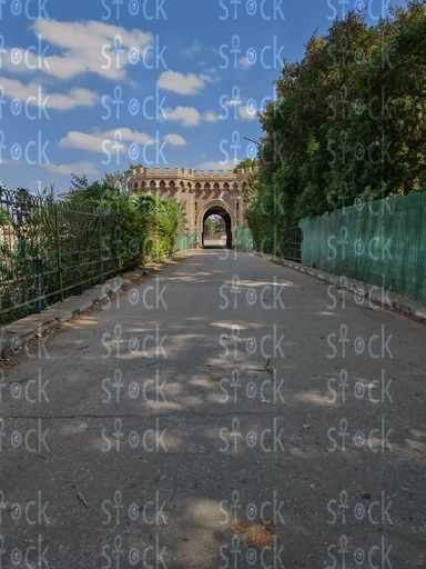 Tree-lined walkway in Qanater