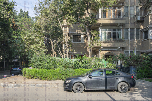 vintage house in Maadi and car parked in front of it