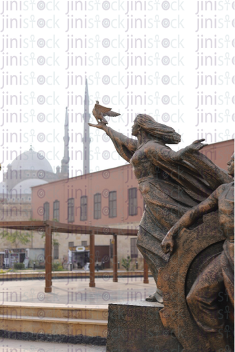 statue for a woman with a bird in the citadel - stock image