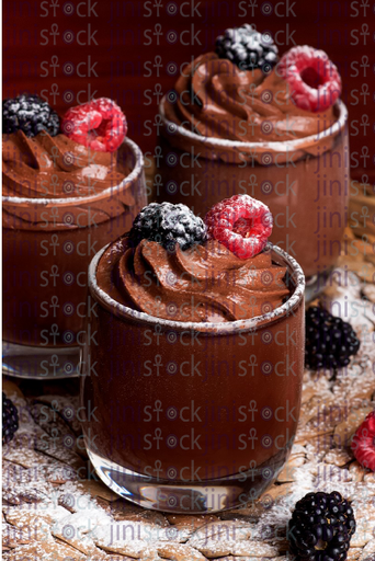 chocolate pudding with rasberry - stock image