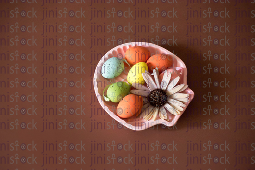 Coloured Easter eggs on plate-stock image