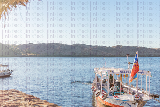 boat anchering at hesa island in the nile