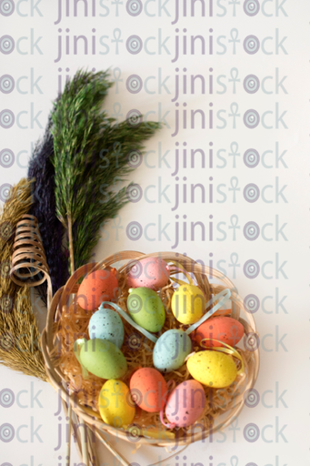 Easter eggs in a basket-stock image