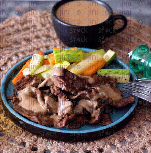 Meat with sauteed vegatables top view - stock image